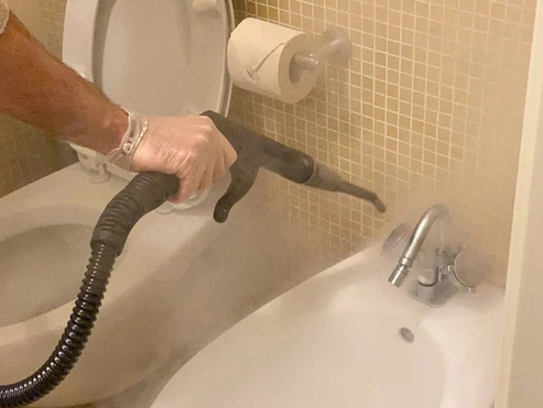 illustration d'un nettoyage vapeur d'un lavabo